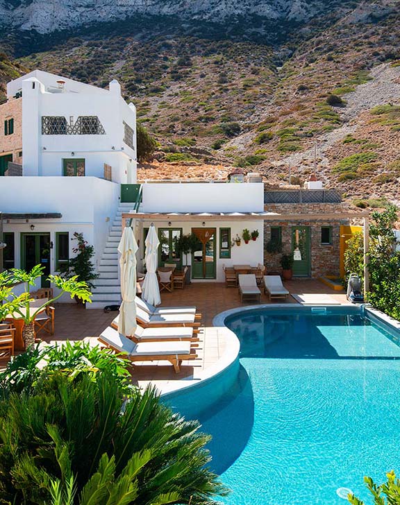 The pool area at Margado accommodation in Sifnos